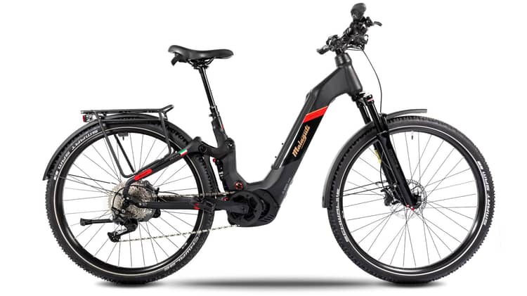 Electric mountain bike with a sleek frame, front suspension, and rear cargo rack, branded as Malaguti Collina.