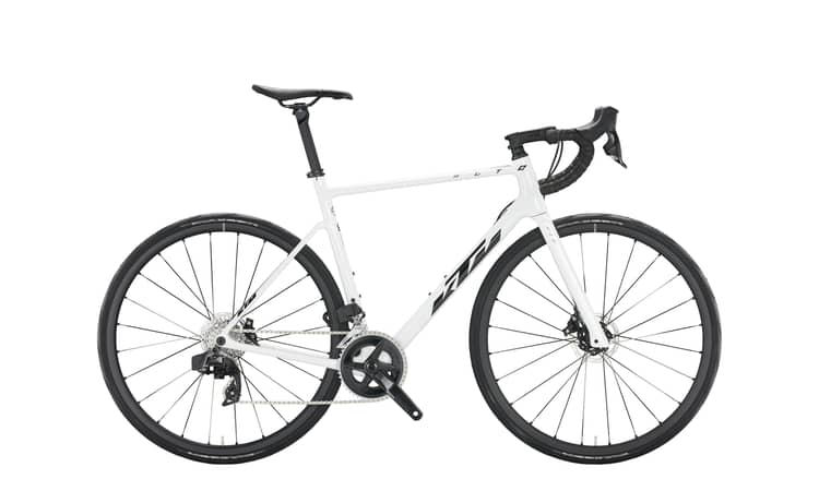 White and black metallic Revelat Alto Elite AXS road bike with disc brakes, size M, 55cm frame on white background.